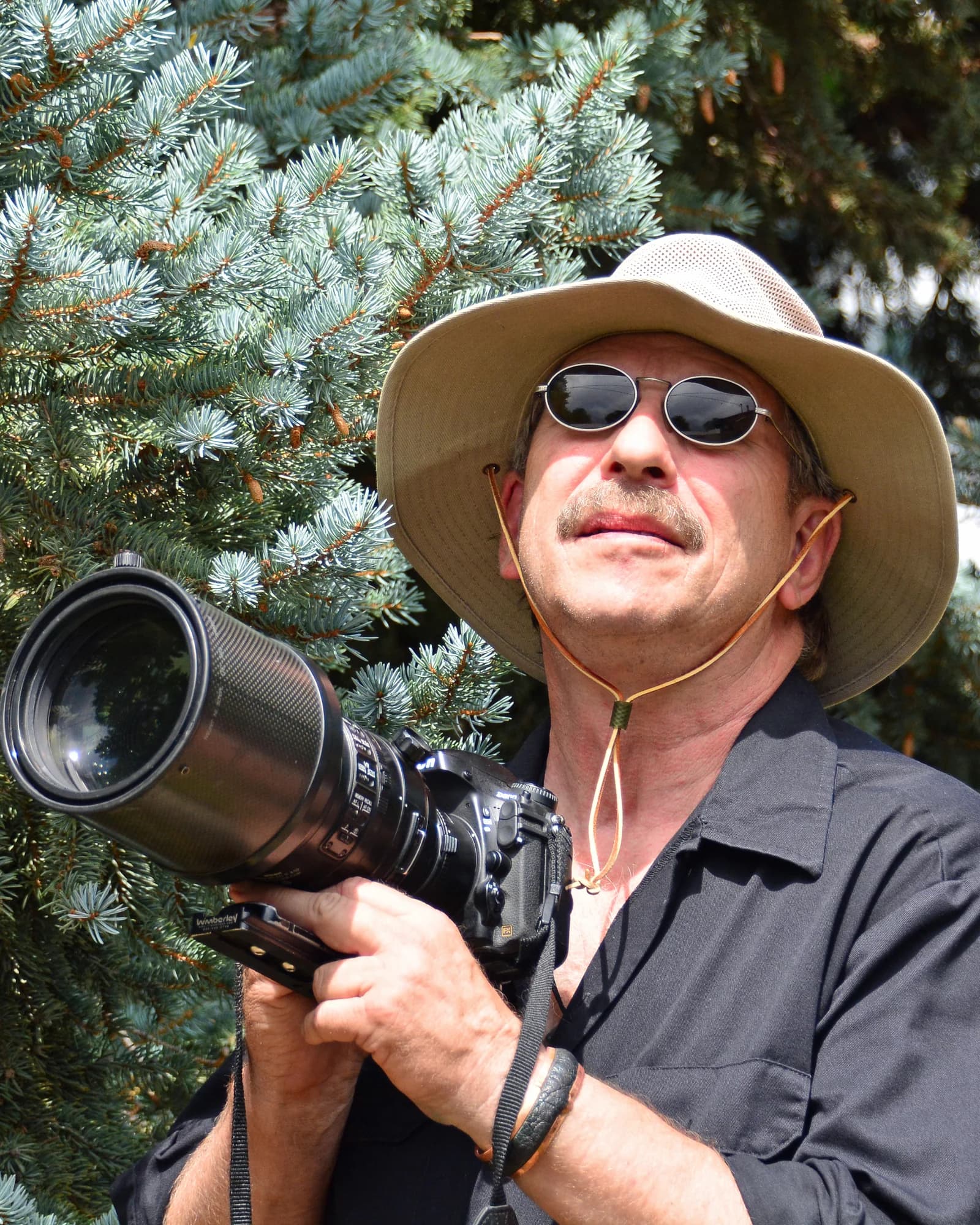 Ron Drummond in the field with a long lens